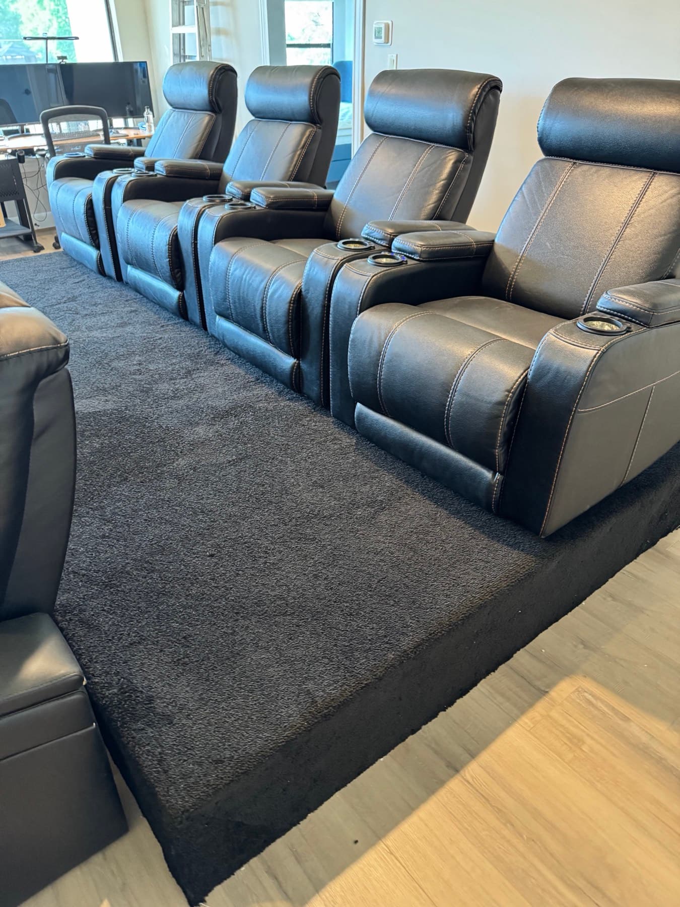 Tiered home theater with leather reclining seats installed by MavTech Pro